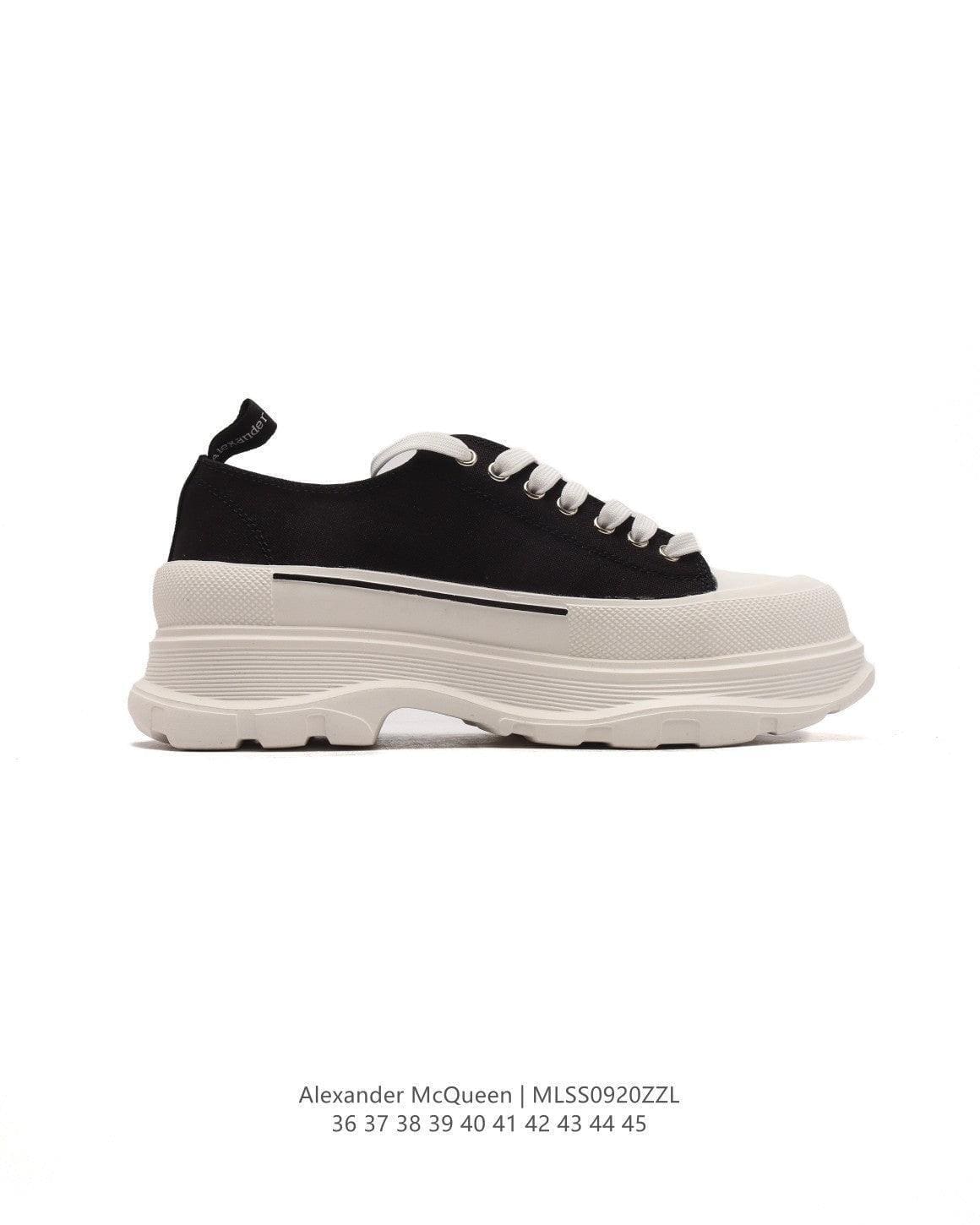 Alexander McQueen Women Tread Slick lace-up Sneakers 'Black/White' | Banlieue91