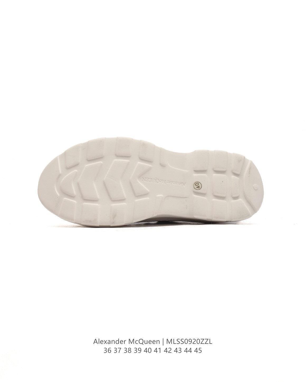 Alexander McQueen Women Tread Slick lace-up Sneakers 'Black/White' | Banlieue91