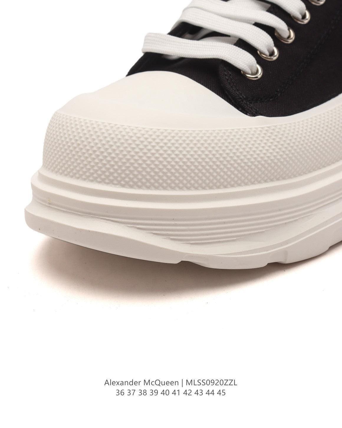 Alexander McQueen Women Tread Slick lace-up Sneakers 'Black/White' | Banlieue91