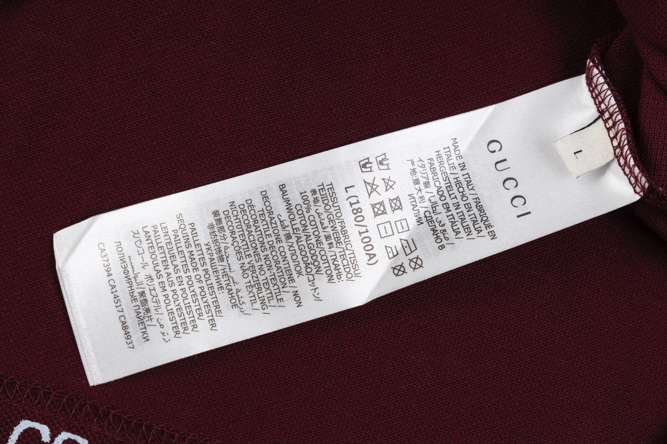 Back view of the Gucci T-shirt with a collar, illustrating its sophisticated cut and comfortable fit.
