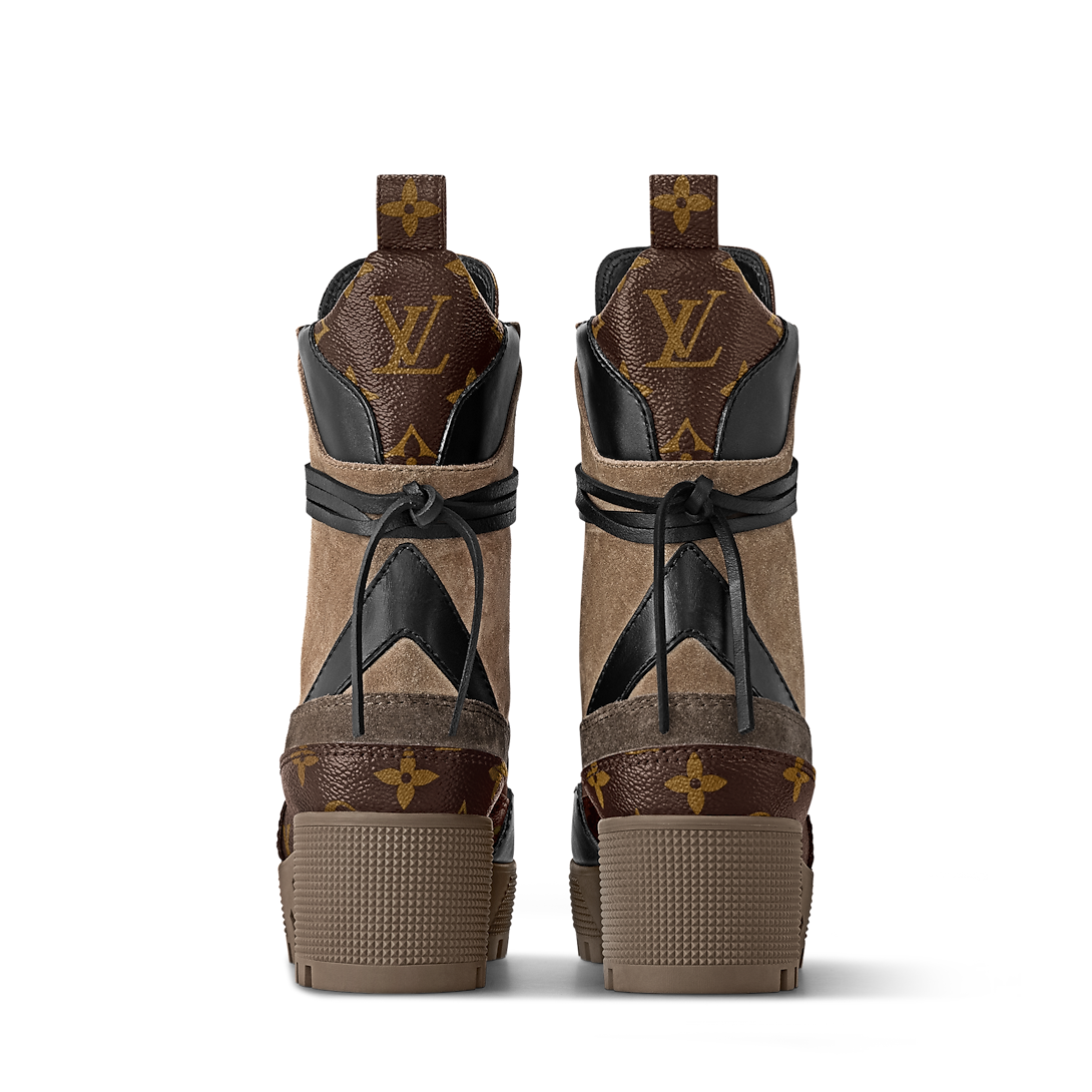 Back view of Louis Vuitton Laureate Platform Desert Boots highlighting the Monogram canvas back loop.