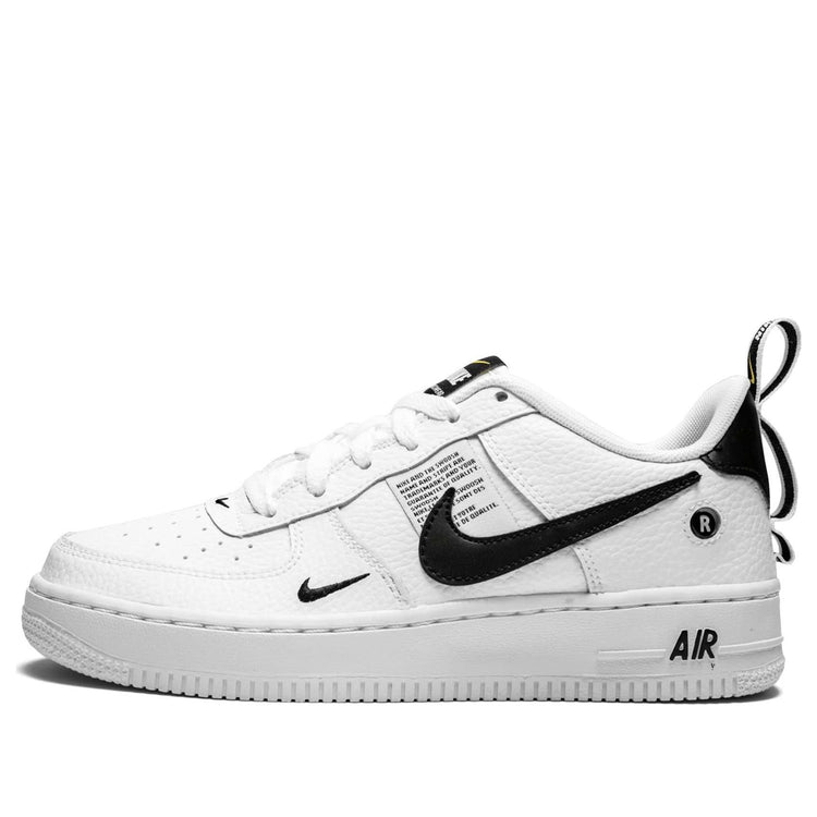 Close-up of Nike Air Force 1 '07 LV8 'Overbranding' sneaker featuring multiple Swoosh symbols on pebbled leather.