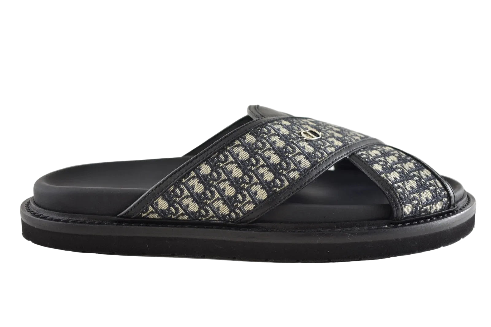 Black sandal with floral pattern on a white background